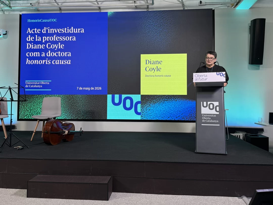 Diane Coyle collecting honorary degree at OUC Barcelona