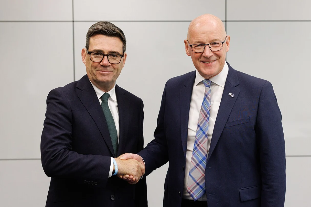 Andy Burnham shakes hands with John Swinney